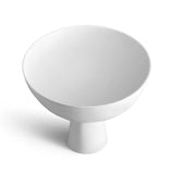 Terra Bowl on Stand - Medium. A round porcelain bowl on tall stand with a dark mineral glaze.