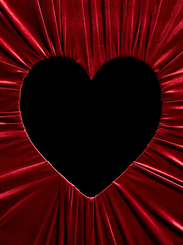 Black heart shape on a red textured background